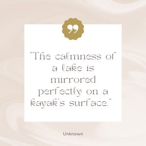 The calmness of a lake is mirrored perfectly on a kayak's surface.
