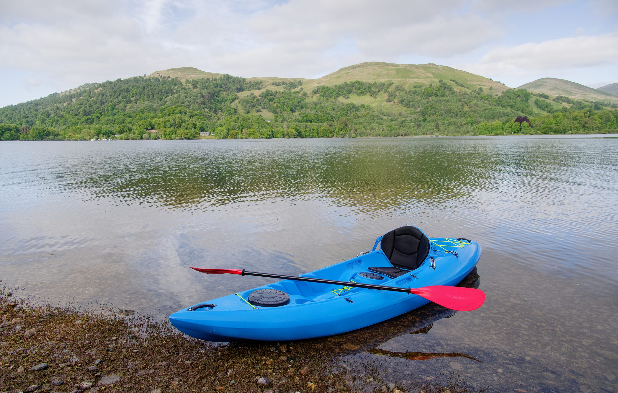 Blue Kayak Moored At Loch Lomond On Island